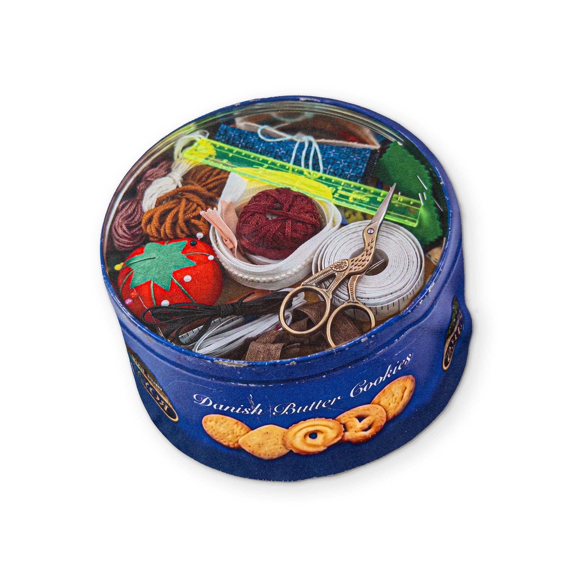 A COOKIE TIN SEWING KIT YOU CAN CLEAN YOUR GLASSES WITH