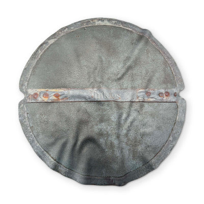 A SEWER LID YOU CAN CLEAN YOUR GLASSES WITH